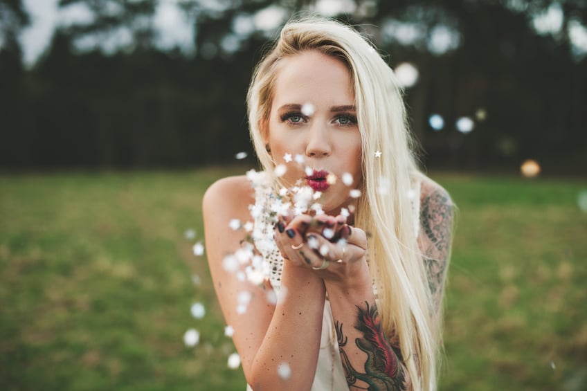 happy woman field flowers portrait