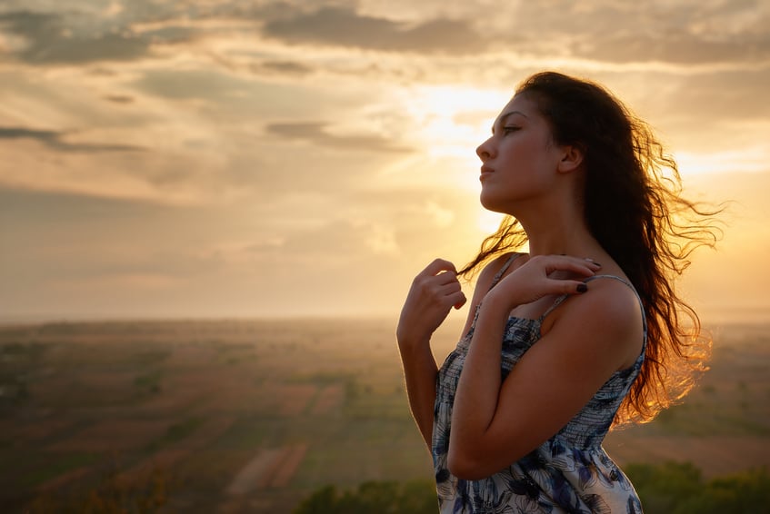 girl portrait at sunset on plain background