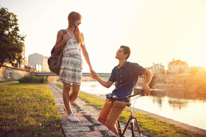 Beautiful love couple enjoying a romantic stroll