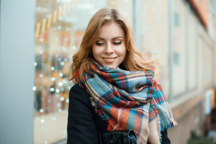 young woman happy outdoors portrait scarf
