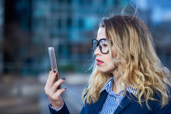 confused woman getting a text