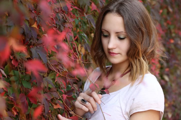 young woman flowers portrait