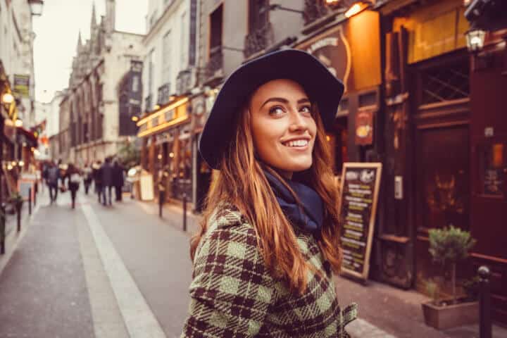 Happy woman on a vacation in Paris