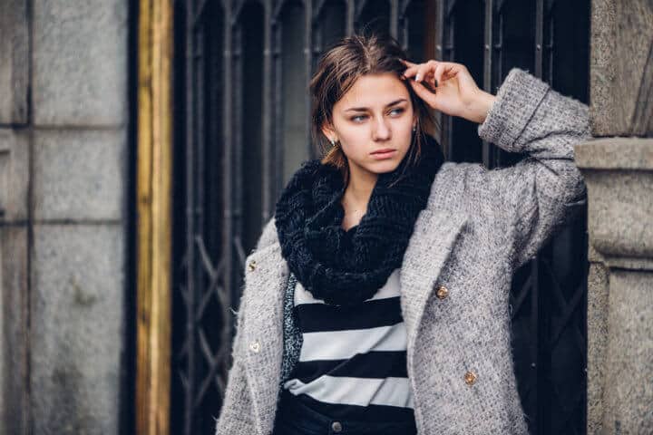 Modern wearing woman walking on the street