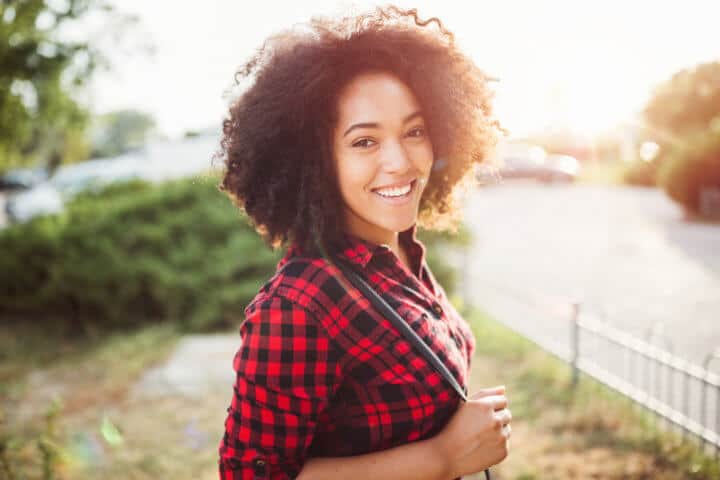 Portrait of beautiful mixed-race woman looking at camera