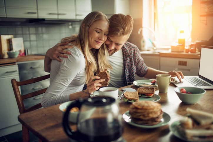 Couple enjoying breakfast together.