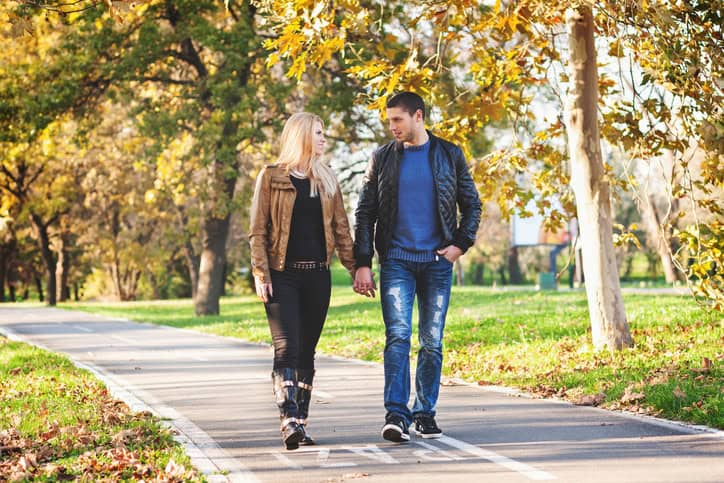 Young couple walking in the park