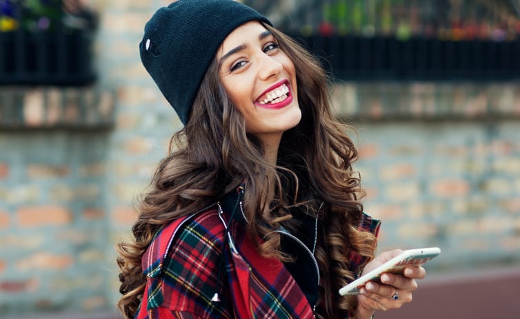 Woman smiling at her friend.