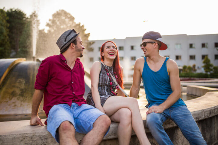 Three happy friends outdoors
