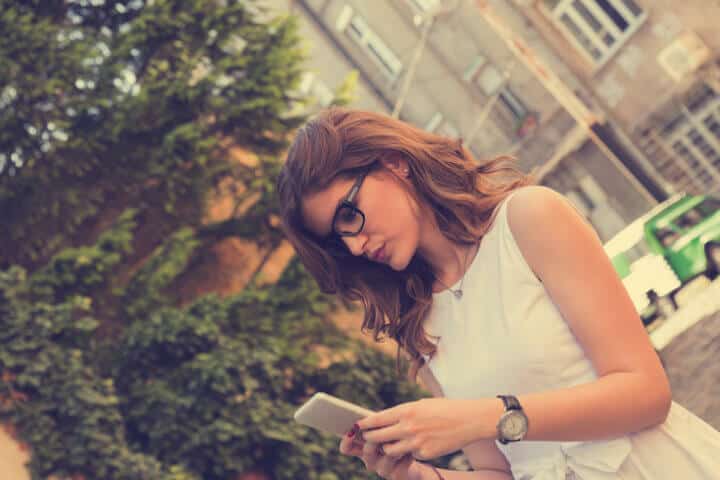 Young woman texting