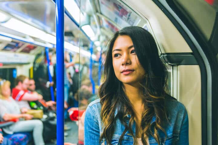 young woman tube travel london