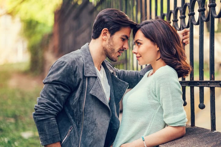 Young man falling in love with cute girl