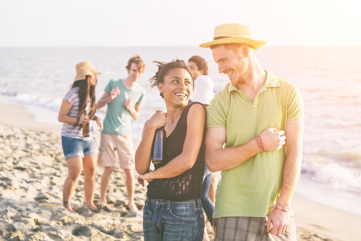 Multiracial Group of Friends Having a Party at Beach