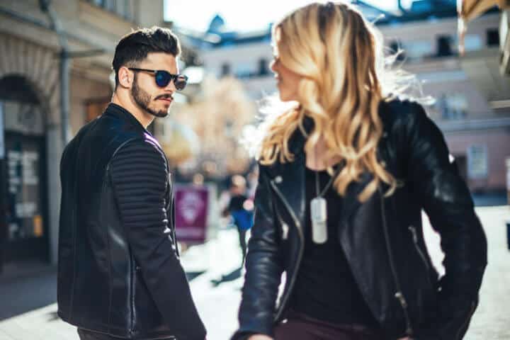 Loving couple looking at each other outdoors.