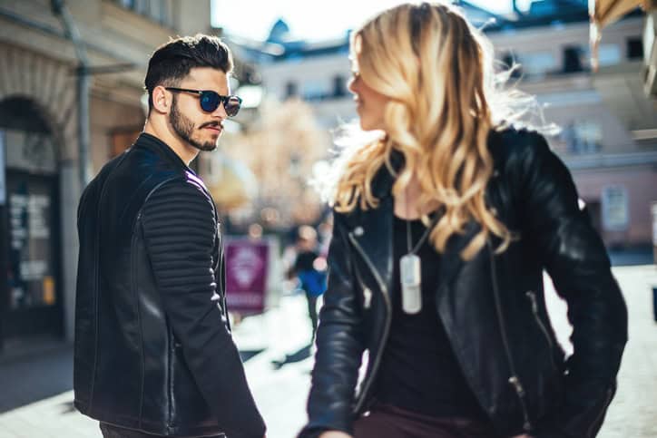 Loving couple looking at each other outdoors.
