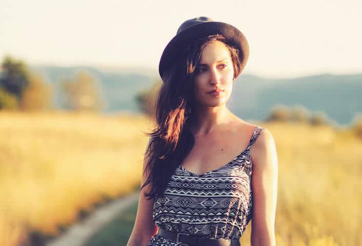 portrait of a young woman wearing a hat
