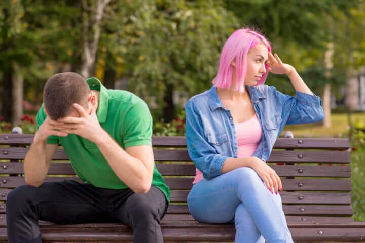 couple awkward bench date romance love