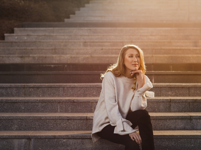 Beautiful young modern woman in the city