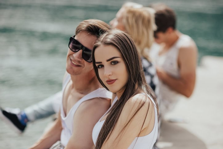 Two couples on a double date near the lake