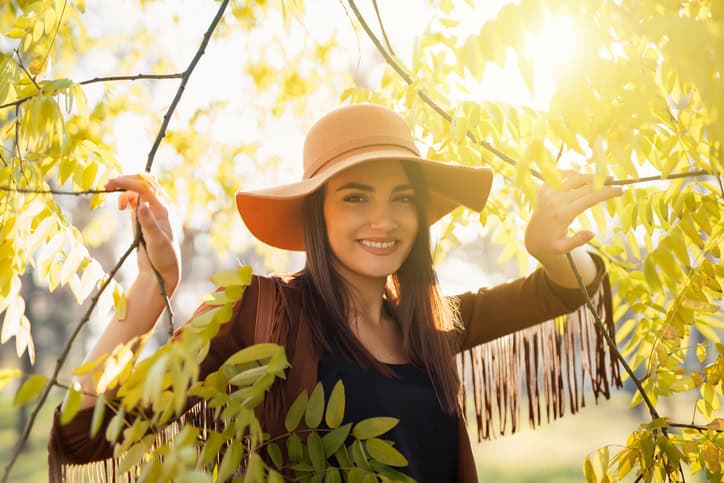 The Sweetest Girl with hat in the trees
