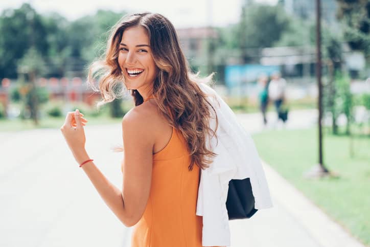 single woman happy smile outside