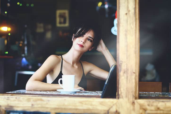 Thoughtful businesswoman having a cup of coffe