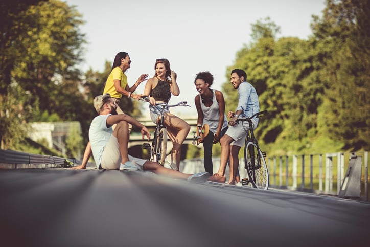 Multi-ethnic group of friends hanging out on the street