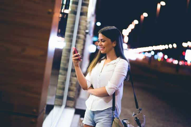 Girl texting at night