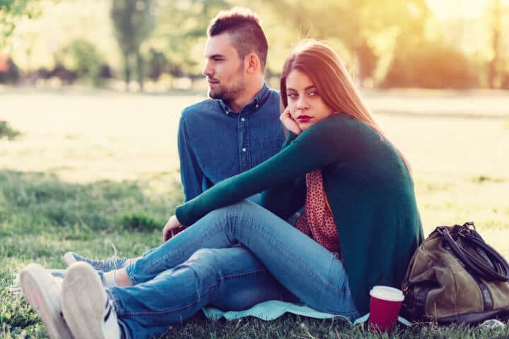 Angry girlfriend spending the day with her boyfriend in the park