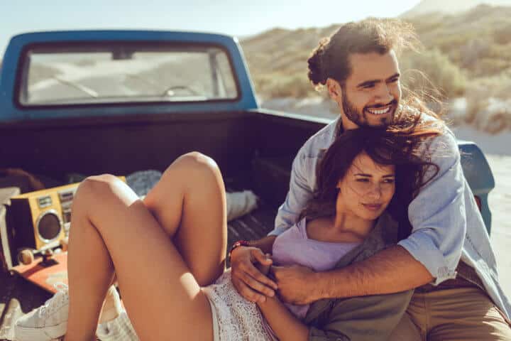 Close up of a couple on a road trip