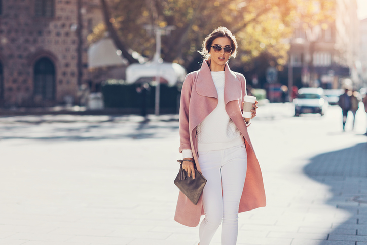 Beautiful successful young woman outdoors on a sunny day