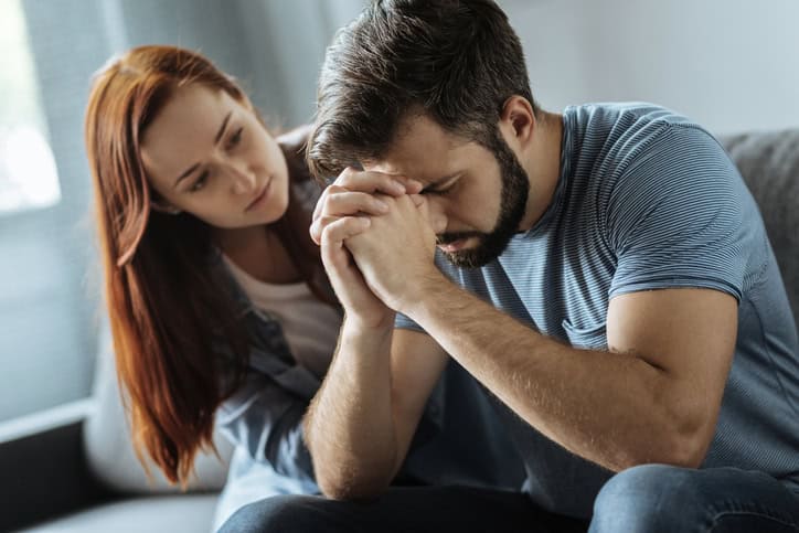 Cheerless thoughtful man dealing with a problem