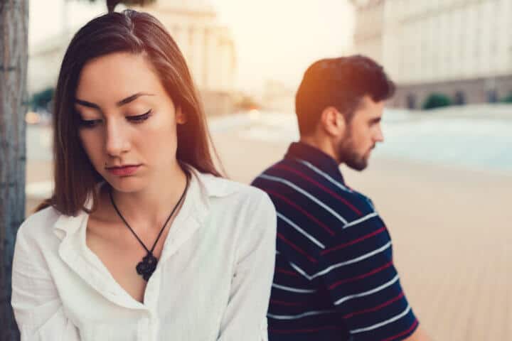Couple fighting back to back
