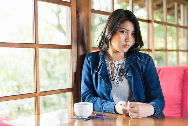 Asian woman in a cafe