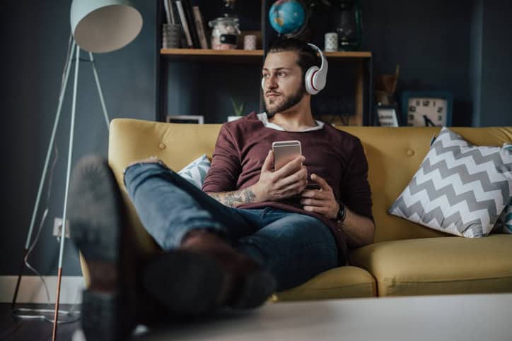 Listening to favorite podcast in relaxing home environment