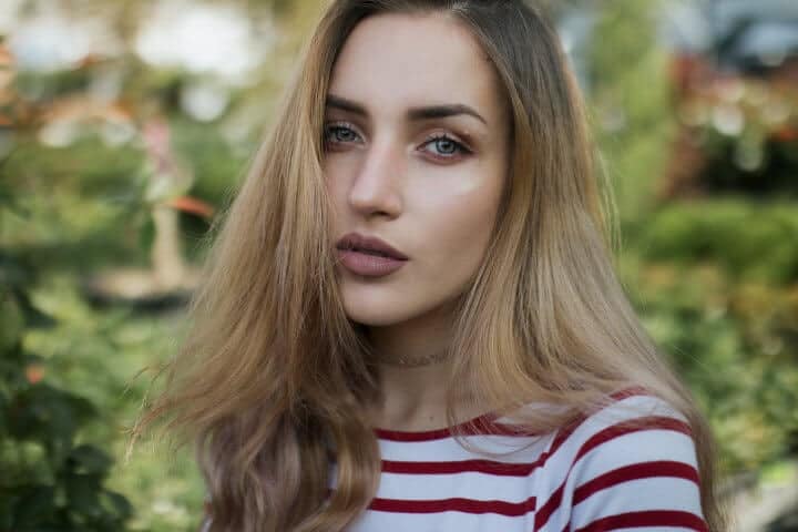 blonde woman facing camera
