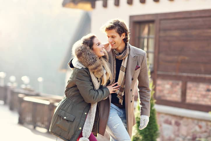Picture showing happy couple walking outdoors in winter
