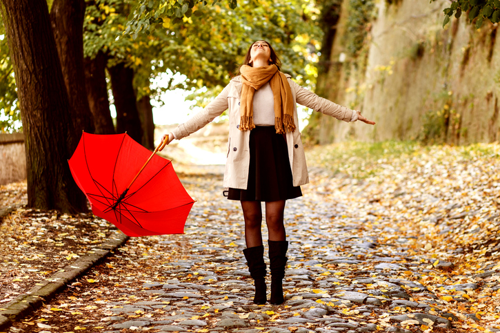 Woman with a red umbrella.
