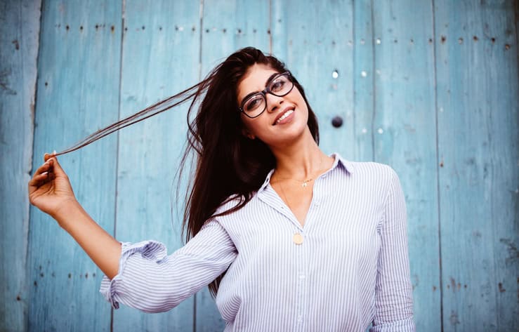 brunette woman with glasses