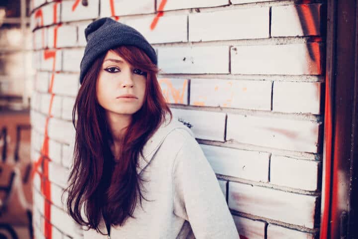 Young woman wall red hair