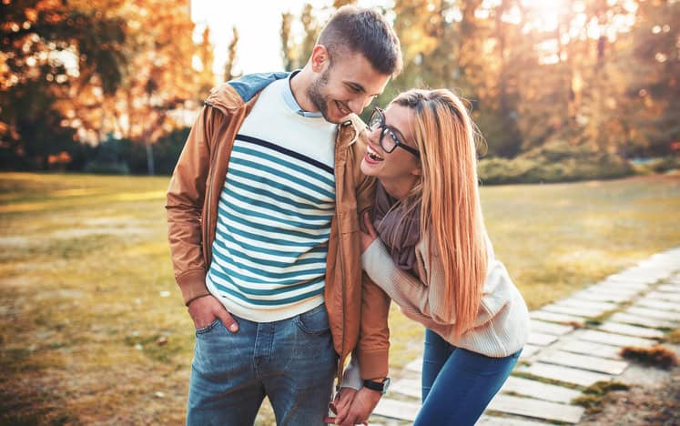 Meeting in the park. Romantic couple in the autumn park. Love, dating, romance