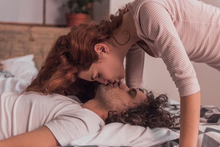 Couple at home in bed
