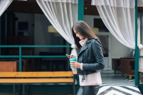 girl looking at phone