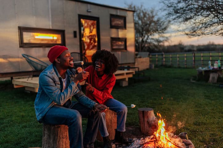 couple at campire on camping trip