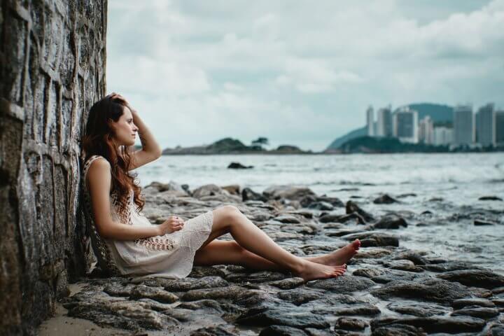 girl beach thinking