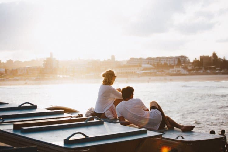 couple beside lake