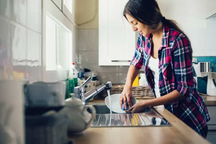 Woman doing the dishes.