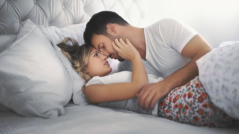 young couple in bed