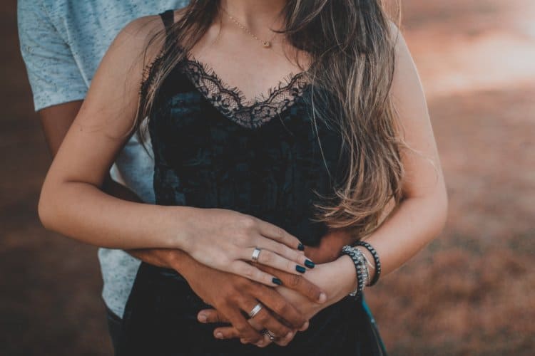 cropped couple hugging
