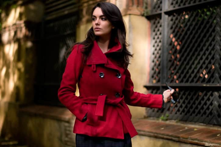 Young girl dressed with red coat